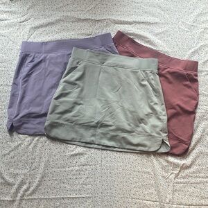 three pastel athletic skorts